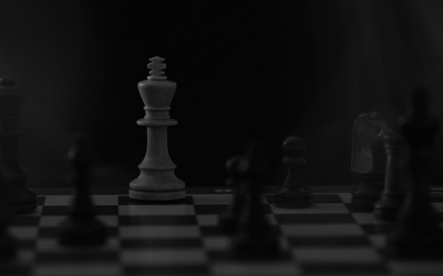 Darkened vision of a chess board with King in focus